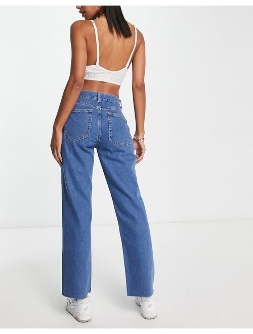 ASOS DESIGN 90s straight jean with raw hem in mid blue