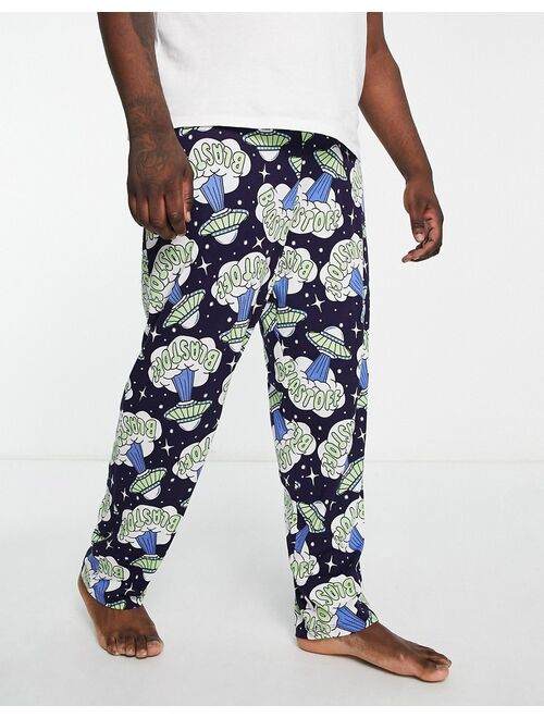 ASOS DESIGN lounge bottoms in navy with blast off print