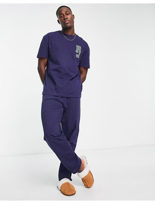 ASOS DESIGN pajama set with t-shirt and pants in navy with embroidery