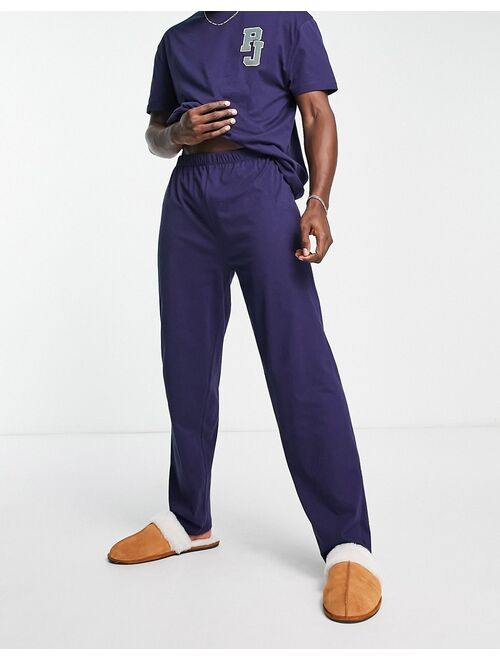 ASOS DESIGN pajama set with t-shirt and pants in navy with embroidery