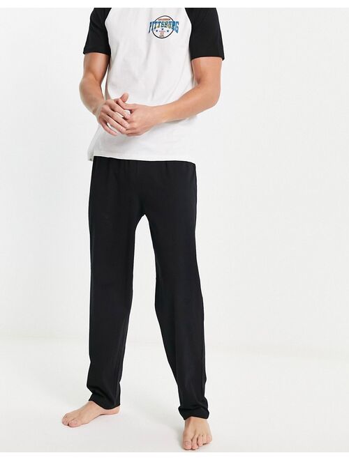 ASOS DESIGN pajama set in black with white raglan T-shirt and Pittsburg print