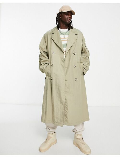 ASOS DESIGN extreme oversized nylon trench coat with MA1 pocket and rouching detail in sage