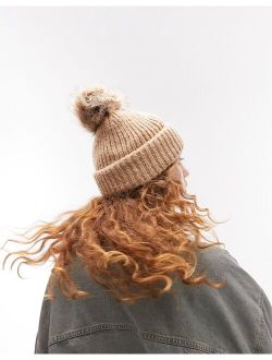 knitted fur pom pom beanie in camel - TAN