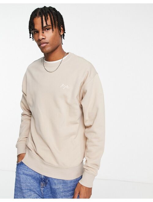 New Look mountain embroidered sweatshirt in stone
