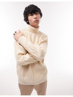 knitted cable heavyweight sweater with roll neck in stone
