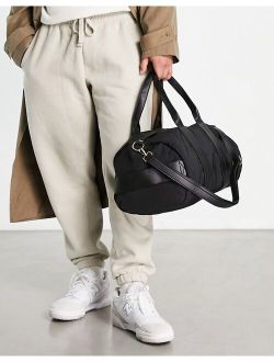 soft holdall bag with detachable strap in black