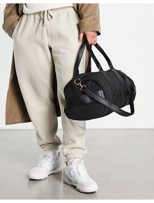 ASOS DESIGN soft holdall bag with detachable strap in black