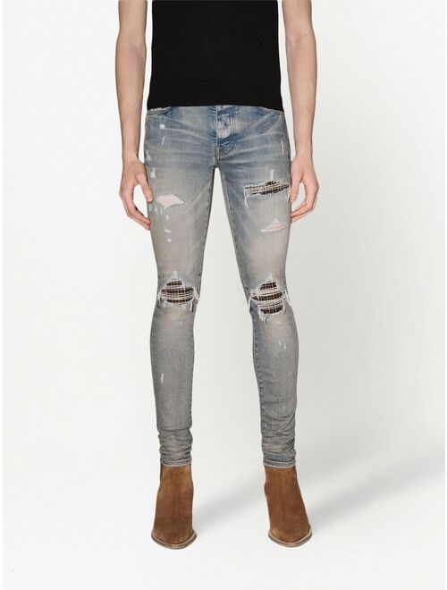 AMIRI Neon Plaid skinny jeans