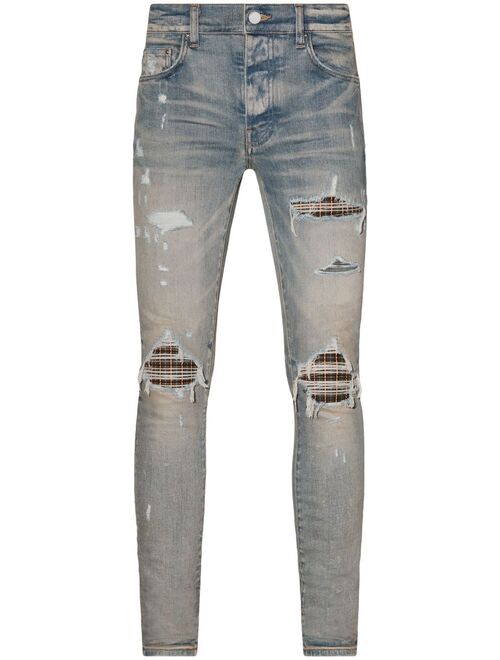 AMIRI Neon Plaid skinny jeans