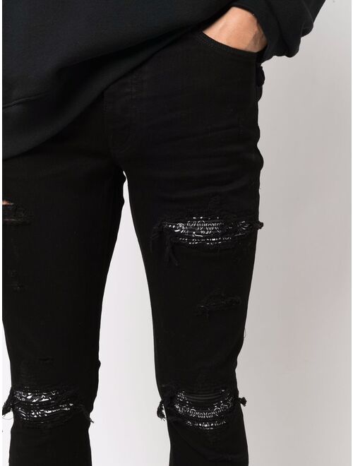 AMIRI ripped-detailing skinny jeans