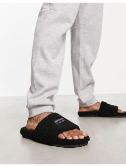 teddy slider slipper in black