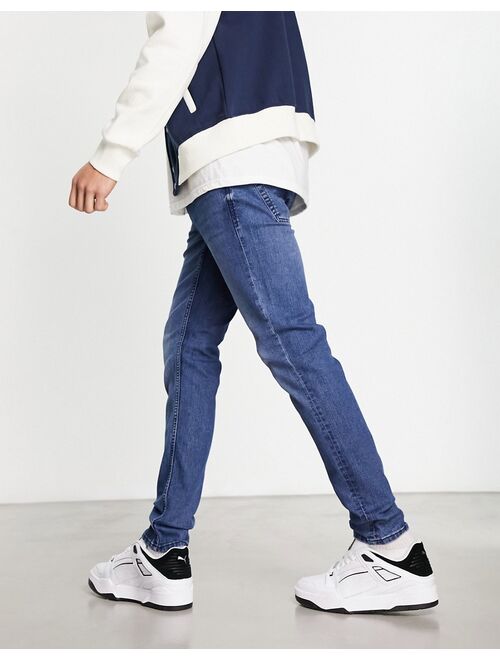 Only & Sons warp skinny fit jeans in mid blue
