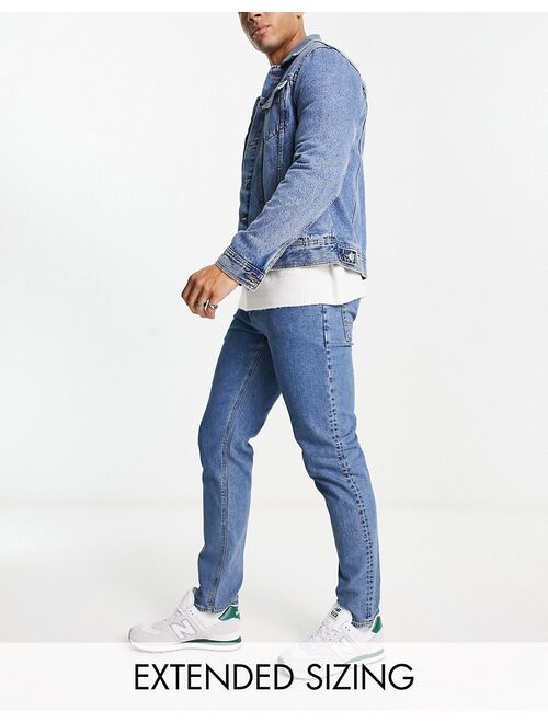 ASOS DESIGN slim jeans in flat mid wash blue