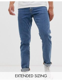 slim jeans in flat mid wash blue