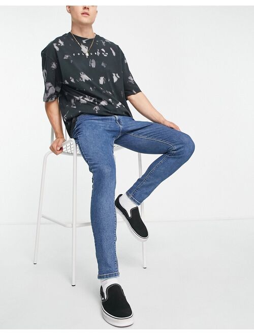 COLLUSION x001 skinny jeans in blue mid wash