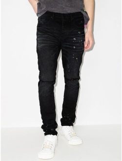 paint splatter-effect skinny jeans