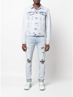 distressed slim-fit jeans