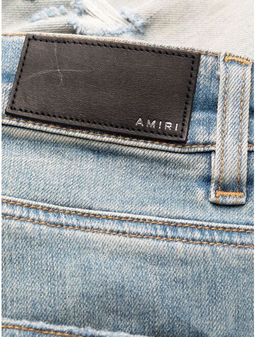 AMIRI distressed skinny jeans