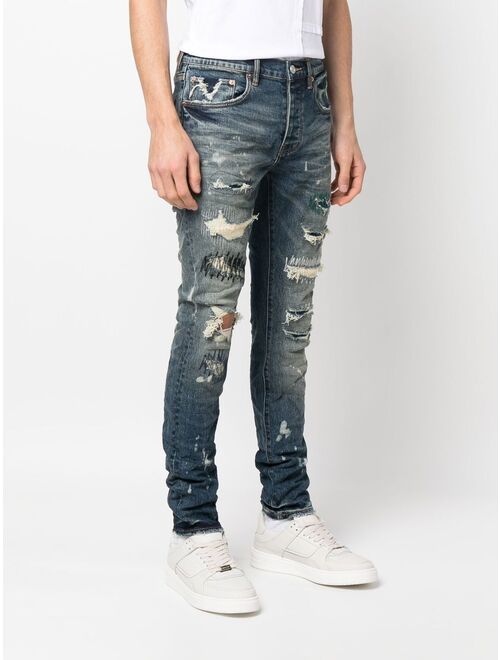 Purple Brand extreme-distressed slim jeans