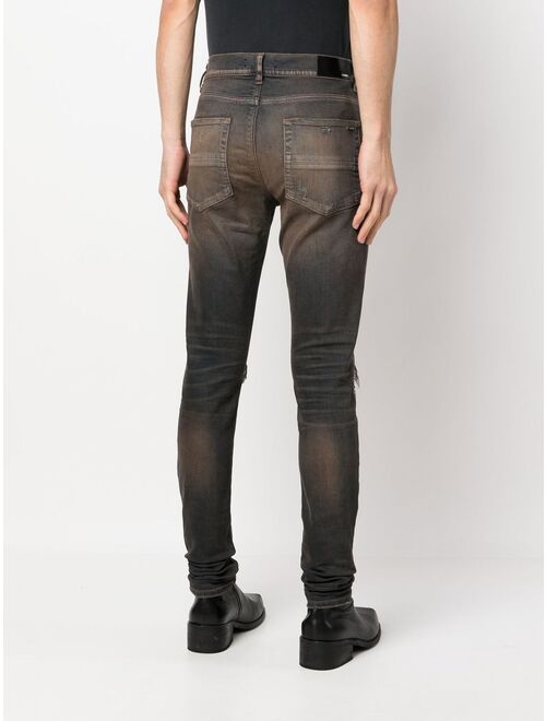 AMIRI ripped-detail skinny jeans