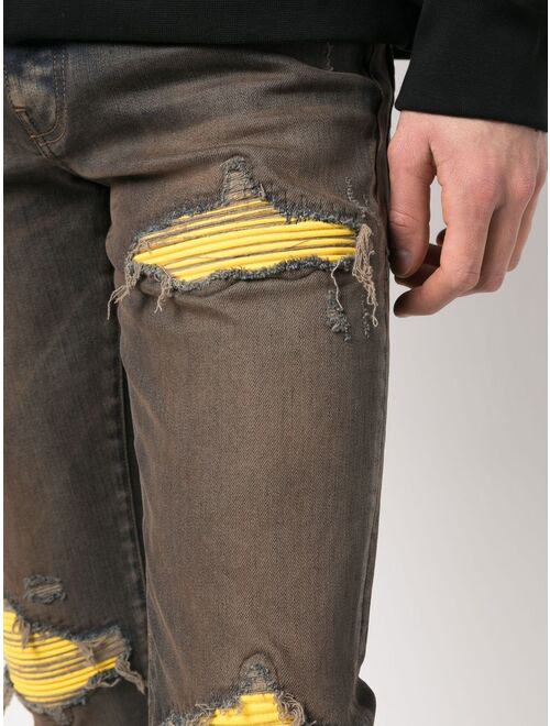 AMIRI ripped-detail skinny jeans