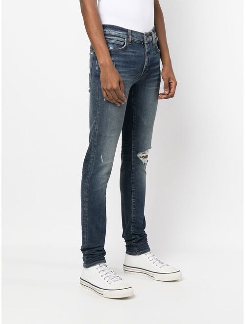 AMIRI distressed-effect skinny jeans