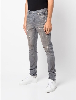 paint splatter-print distressed jeans