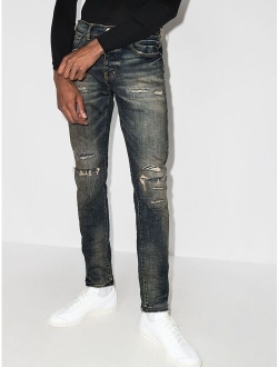 Repair distressed skinny jeans