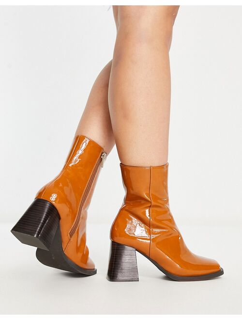 ASOS DESIGN Wide Fit Reform mid-heel boots in tan patent