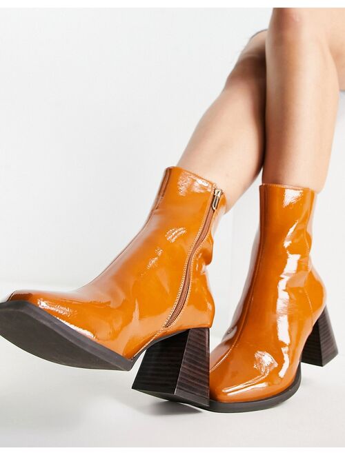 ASOS DESIGN Wide Fit Reform mid-heel boots in tan patent