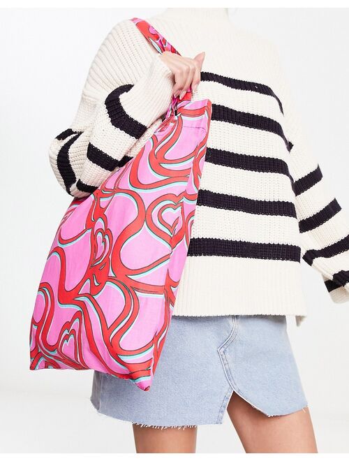 ASOS DESIGN cotton tote bag in heart print in pink
