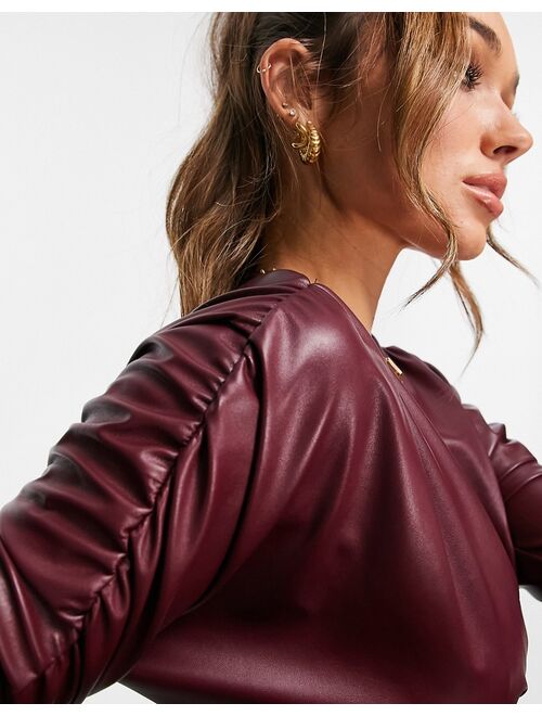ASOS DESIGN leather look ruched front long sleeve top in burgundy