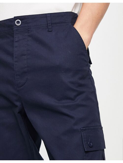 ASOS DESIGN tapered cargo pants in navy with toggles