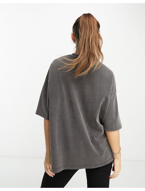 ASOS DESIGN oversized T-shirt with wings graphic in washed charcoal