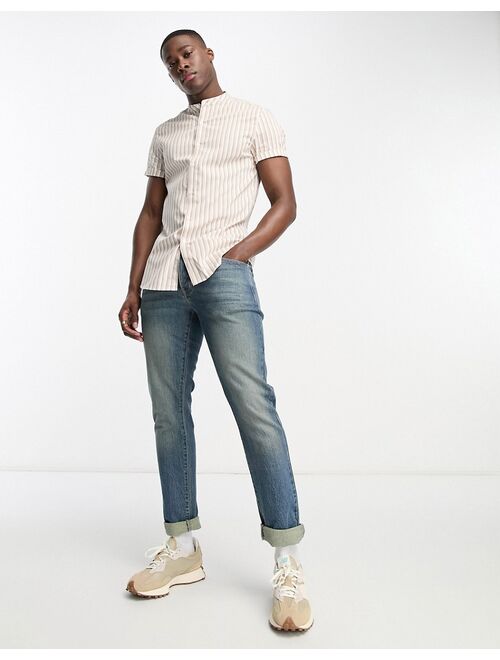 ASOS DESIGN skinny stripe shirt with roll sleeve in tan