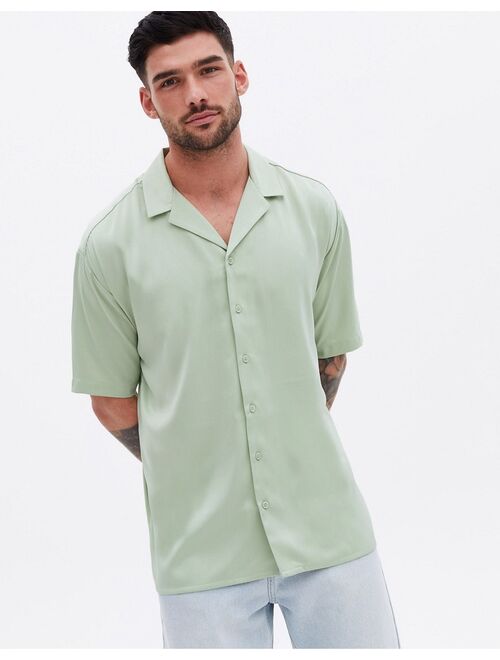 New Look oversized short sleeve satin shirt in light khaki