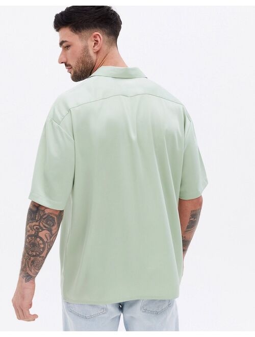 New Look oversized short sleeve satin shirt in light khaki