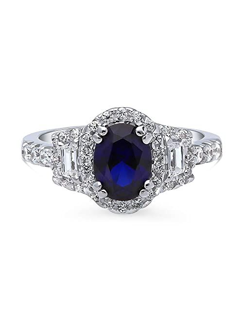BERRICLE Sterling Silver 3-Stone Simulated Blue Sapphire Oval Cut Cubic Zirconia CZ Halo Fashion Ring for Women, Rhodium Plated Size 4-10