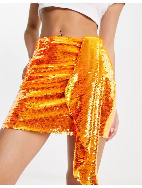 Glamorous mini skirt with tie front in bright orange sequin