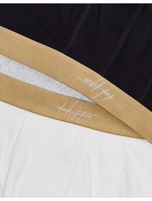 ASOS DESIGN 5-pack jersey trunks in black and white with gold Dark Future waistband