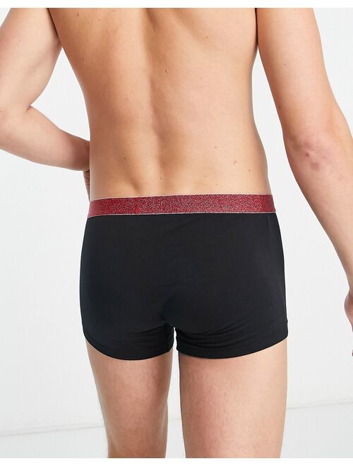 ASOS DESIGN jersey trunks in black with red glitter waistband
