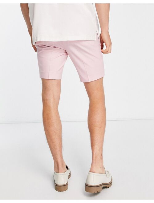 ASOS DESIGN smart skinny shorts with prince of wales check in pink