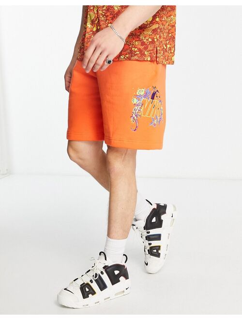 Nike Logo Twist glow in the dark logo shorts in orange