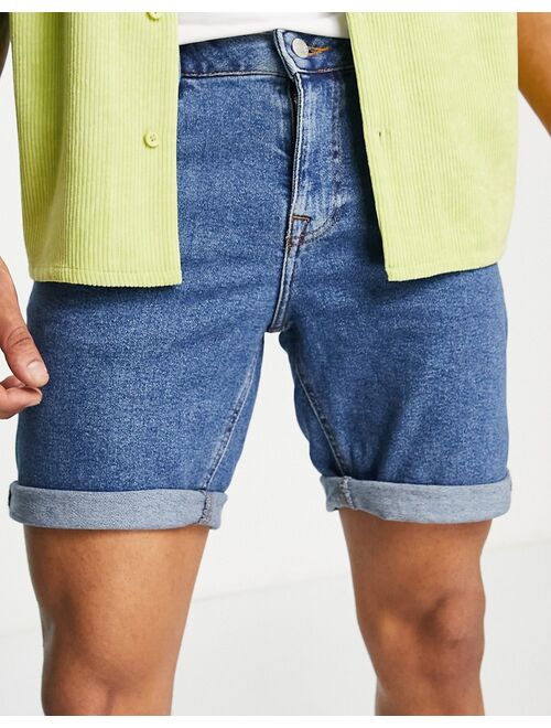 ASOS DESIGN stretch denim shorts in flat mid wash blue