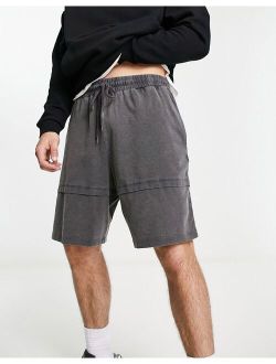 oversized shorts in black acid wash with double layer