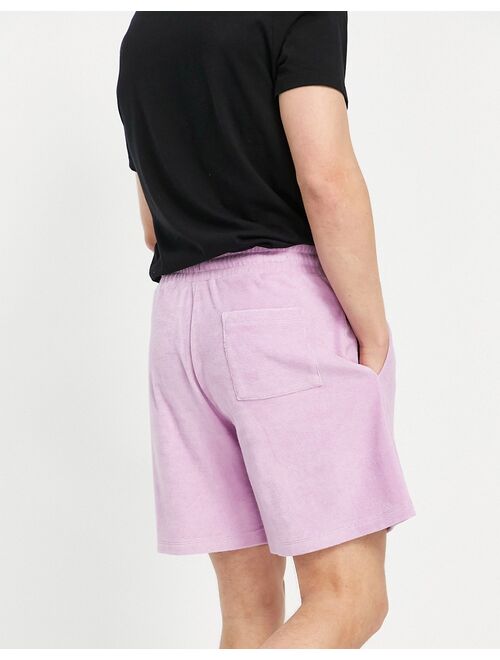 ASOS DESIGN relaxed short in purple terrycloth with text embroidery