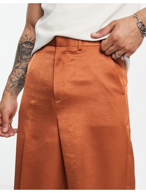 ASOS DESIGN smart longline wide satin shorts in burnt orange