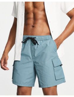 relaxed fit shorts with pockets in teal