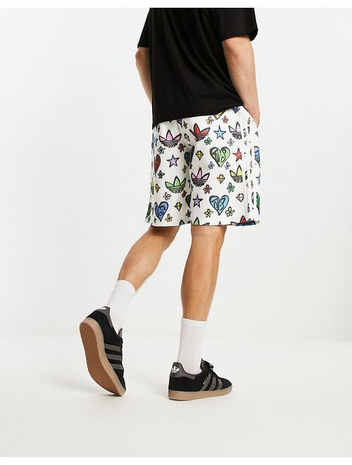 adidas Originals x Jeremy Scott 10 inch shorts in white and multi