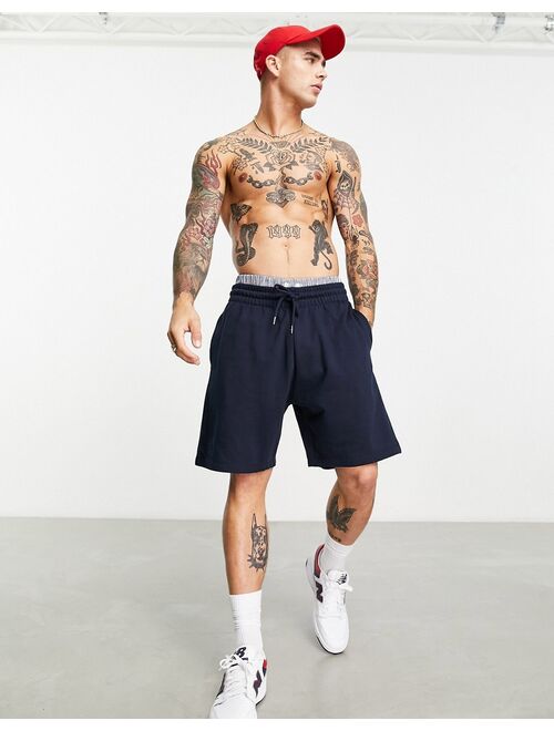 ASOS DESIGN oversized jersey mid length shorts in navy